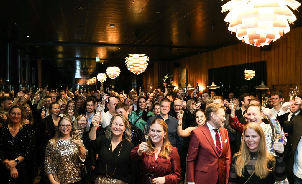 group of people celebrating at a corporate party