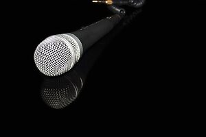 microphone laying down on a black table
